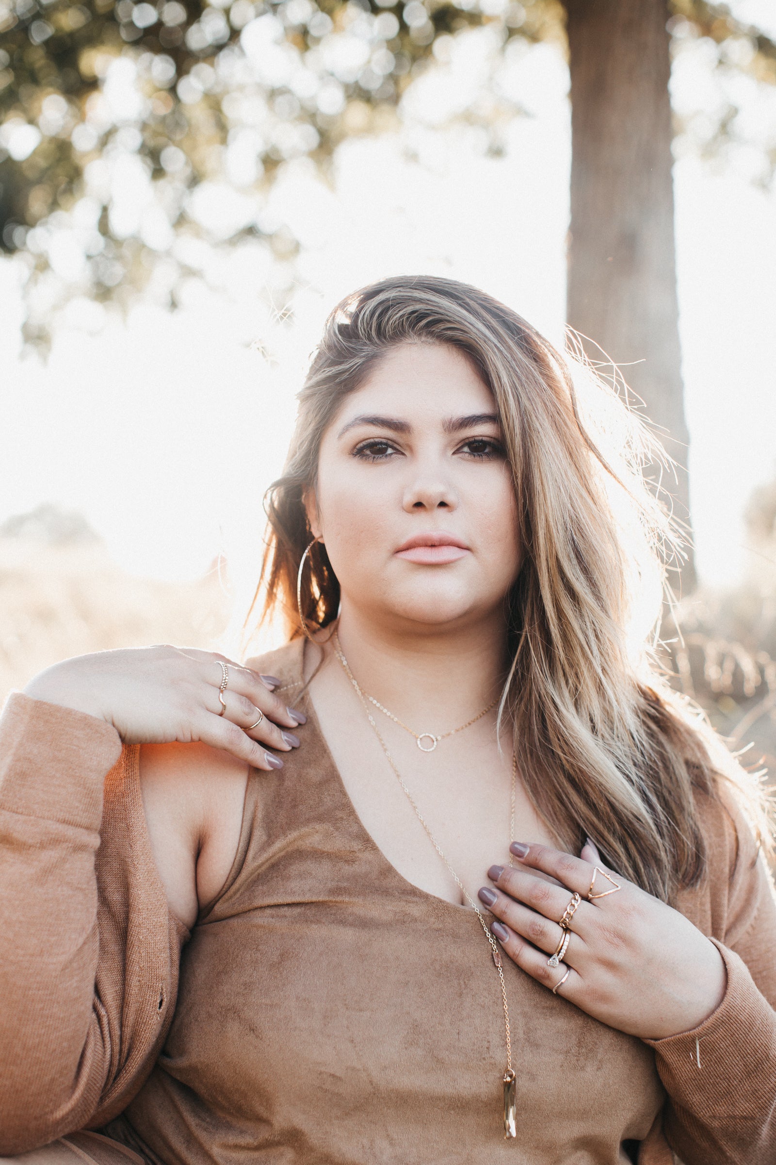 Model wears the Circle Signature Shape Necklace with Crystal Rectangle Lariat