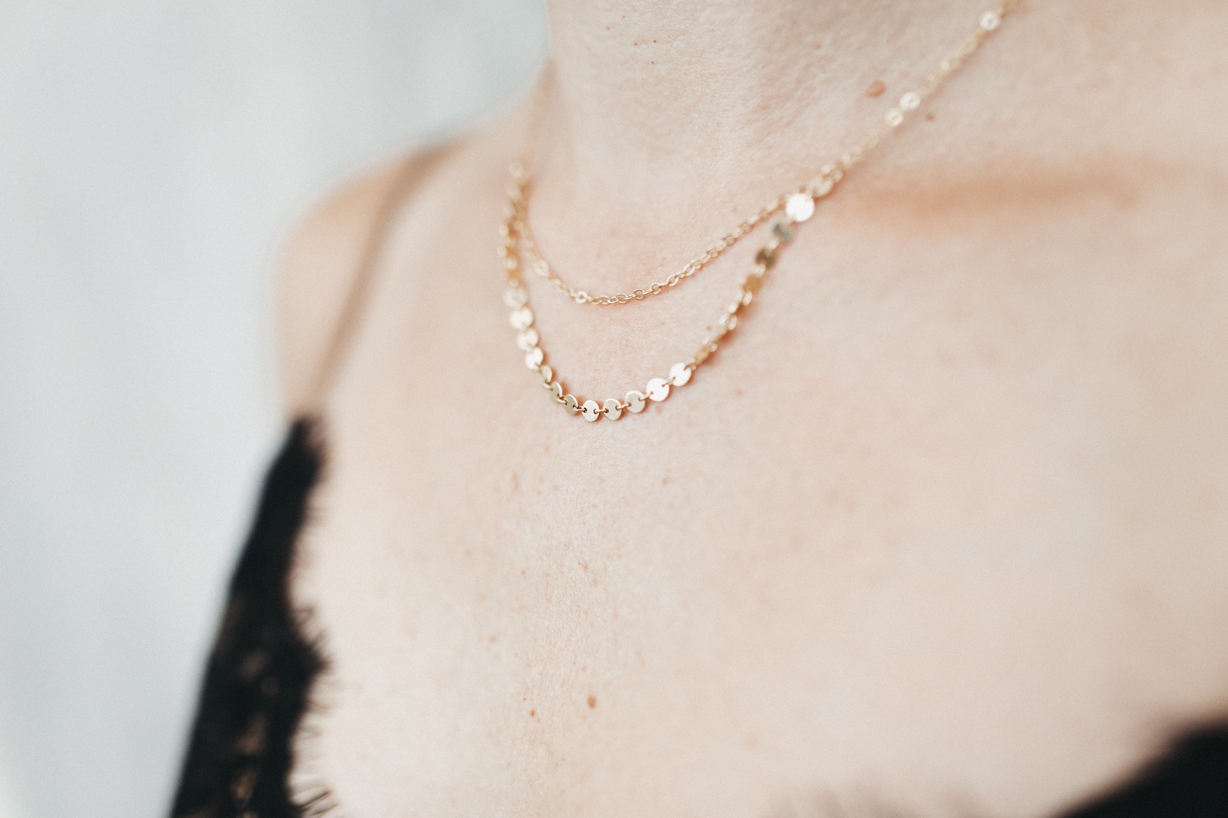 Model wears the 14k Gold Filled Flat Chain Mykonos Necklace