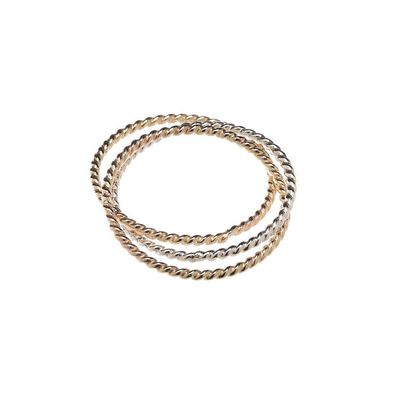 Mixed metal interlocking twisted wire rings