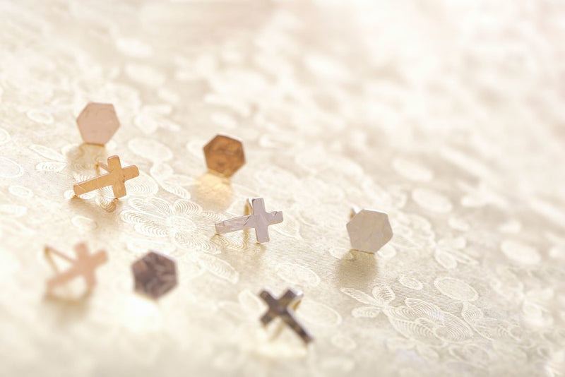 Group os Tiny Hexagon stud earrings and Tiny Cross stud earrings