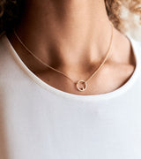 Model wears the 14k Gold Rolloette Necklace with Diamond Accent