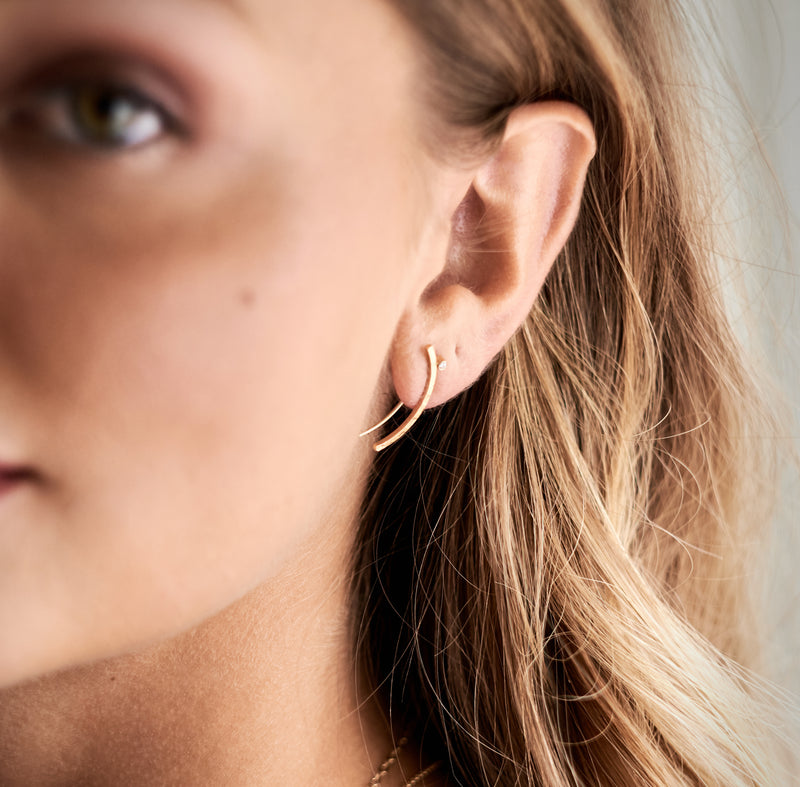 Model wears the PuuR 14k Gold Ear Climbers with Diamond Accent