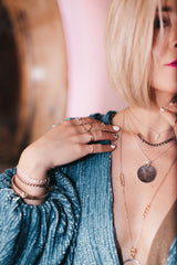 Model layers Gwen Necklace with Trillion Necklace, Medallion Necklace and Janis Necklace