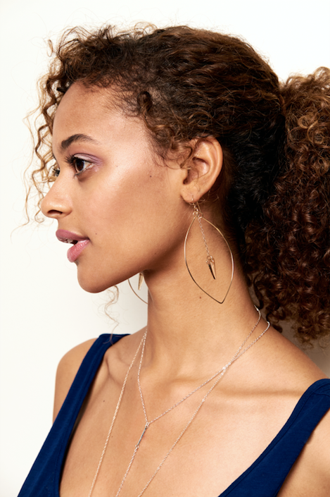 Model wears 14k Gold Filled Erin Earrings with Golden Shadow Spike Crystals