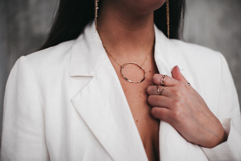 Model styles the Shine Necklace with Chain ring and Triangle Ring