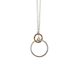 Two-tone sterling silver and rose gold interlocking circles on a chain necklace