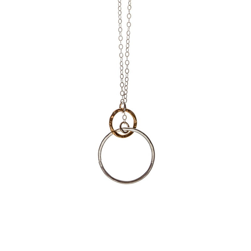 Two-tone sterling silver and rose gold interlocking circles on a chain necklace