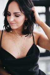 Model wears Talia 10 Disc Necklace with Gwen Necklace and Spike Crystal Hoops