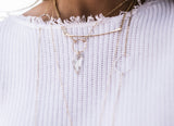 Model wears the 14k Gold Filled Bar Necklace layered with layering chains