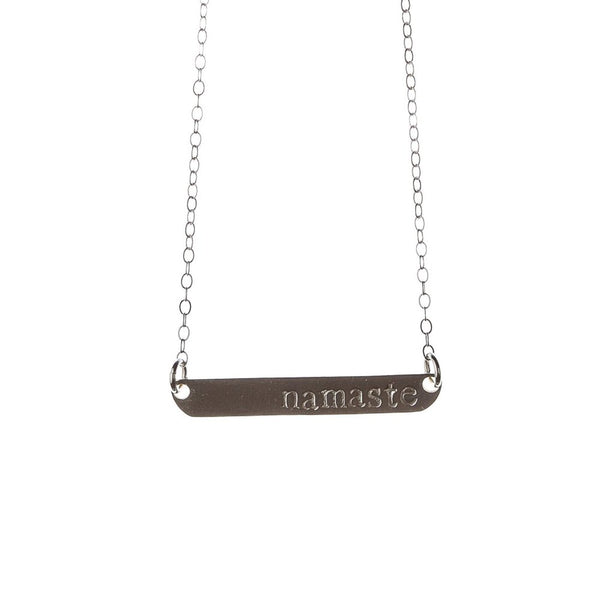 Hand stamped Namaste word place necklace