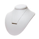 Sterling Silver Namaste word place necklace on a neck display